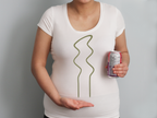 A breezy u trellis in front of a trellis and beside a standard pop can for size reference