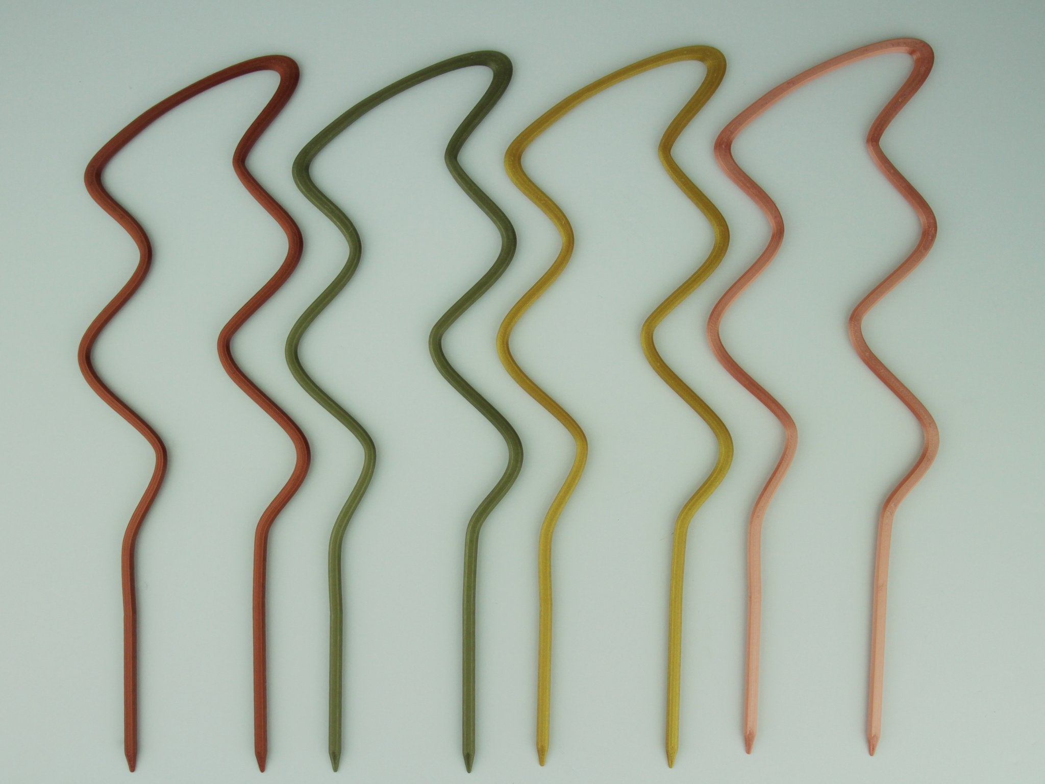 Breezy U trellises in copper, bronze green, gold and rose gold