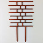 Bricks trellis in copper on a white background
