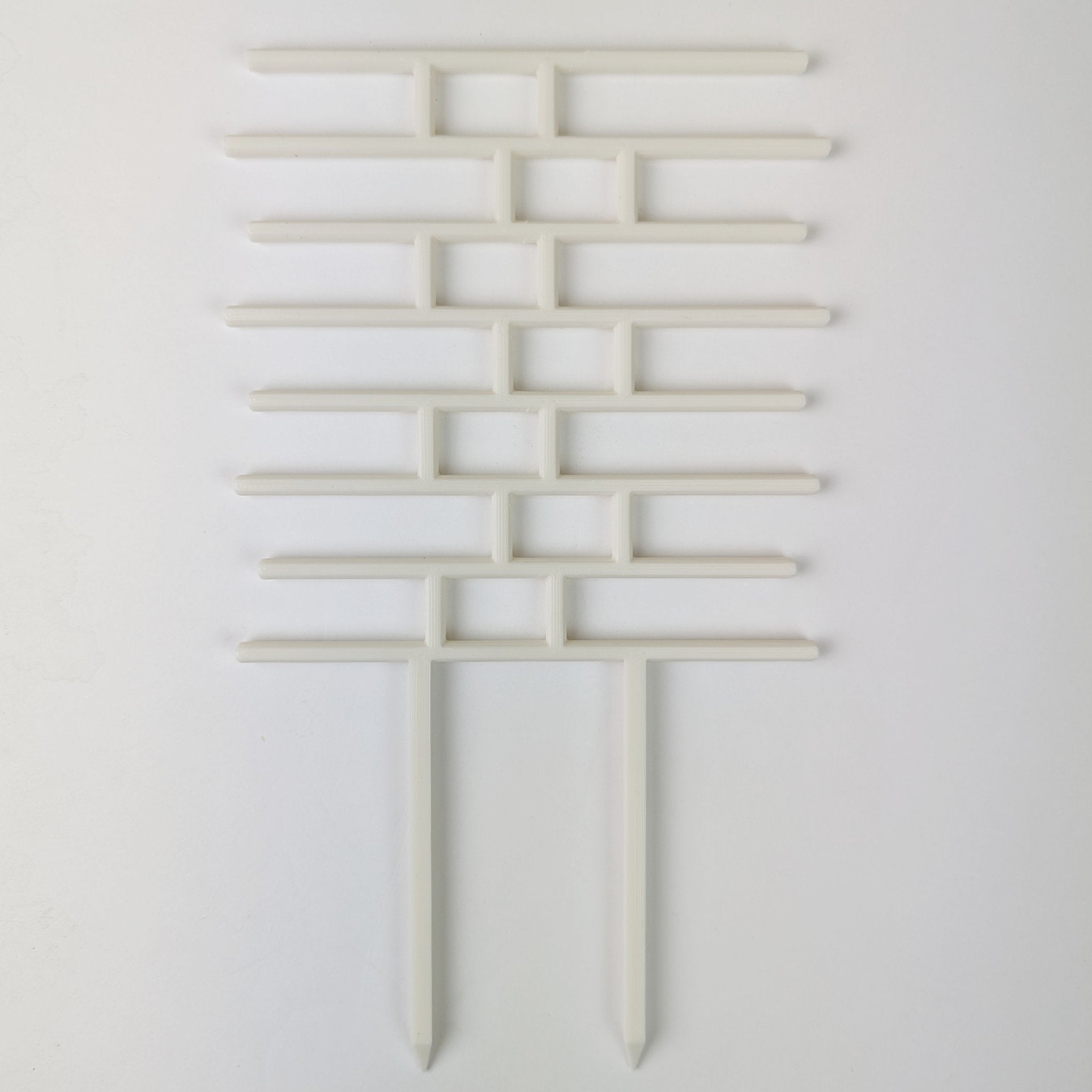 Bricks trellis in white on a white background