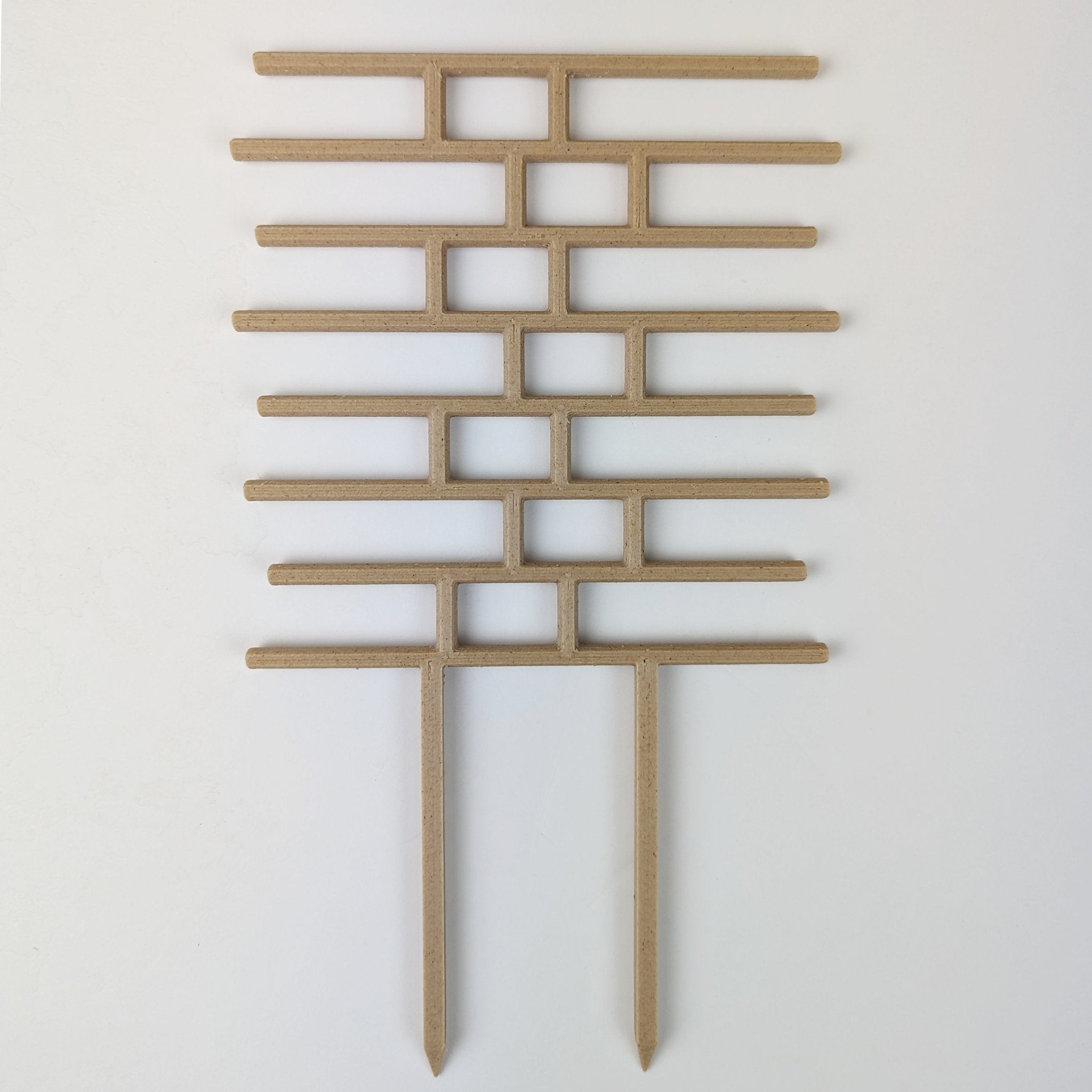 Bricks trellis in wood on a white background