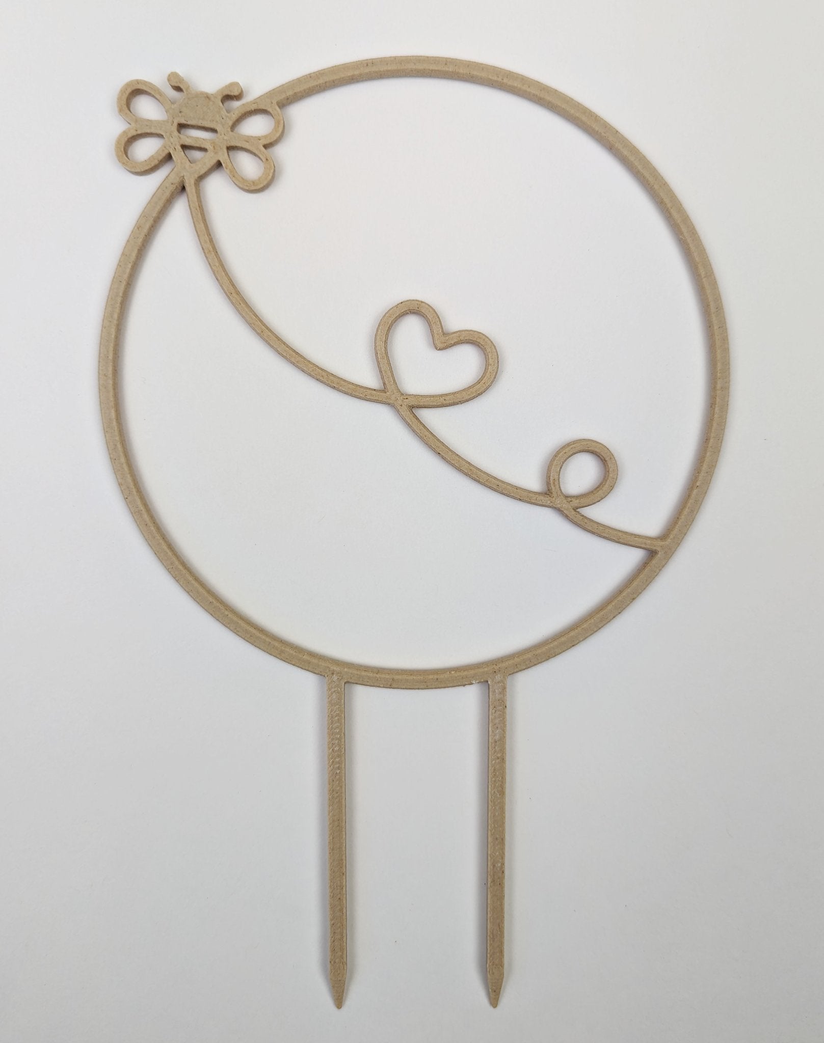 Bumblebee circle trellis with a bee at the top and a heart-shaped trail across the circle