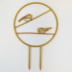 Chickadee trellis in gold, a circle with two chickadees on horizontal branches