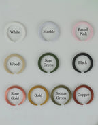 Collection of 3d printed circles in various colors on a white background