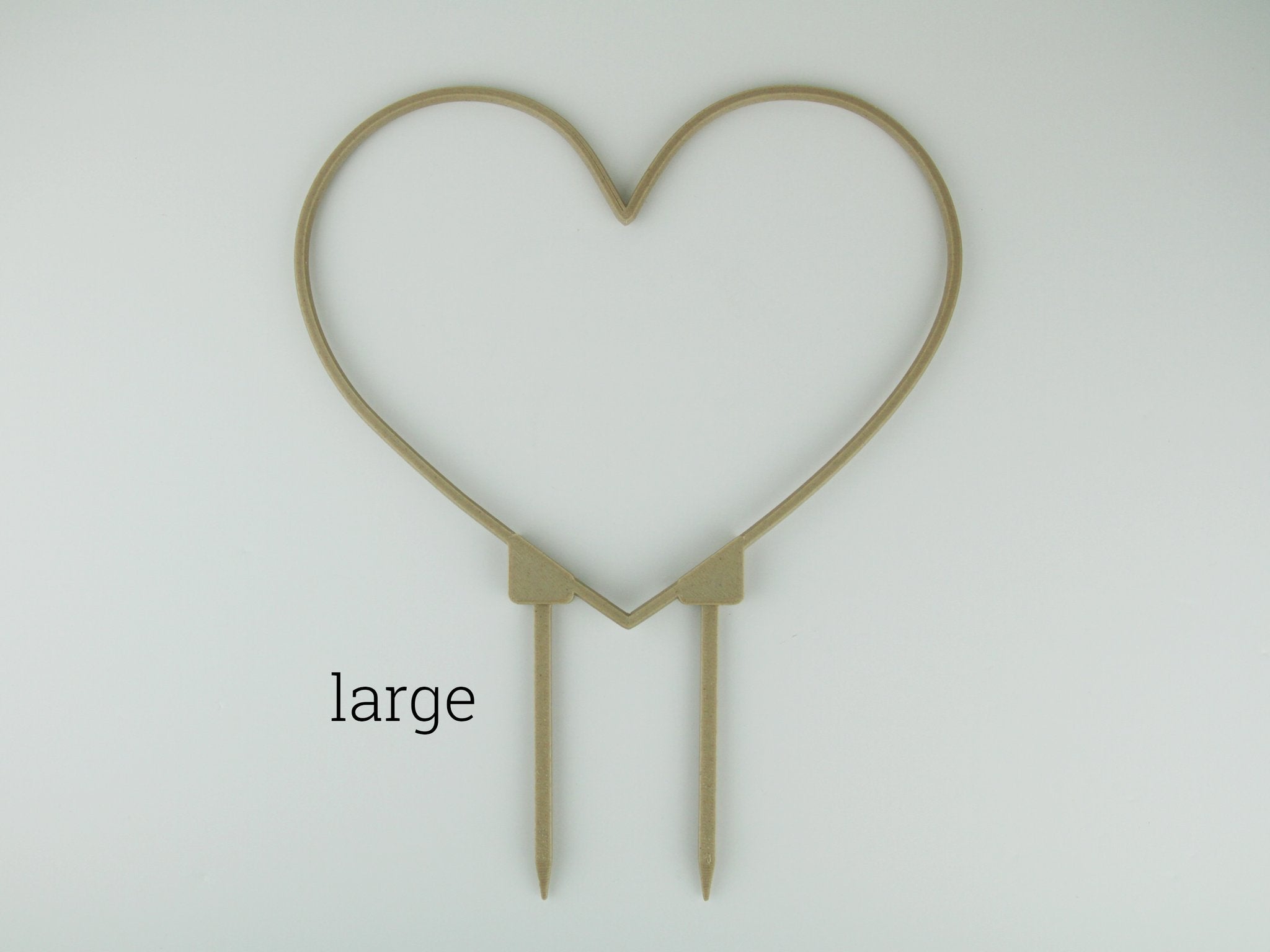 Large heart shaped trellis in a wood finish