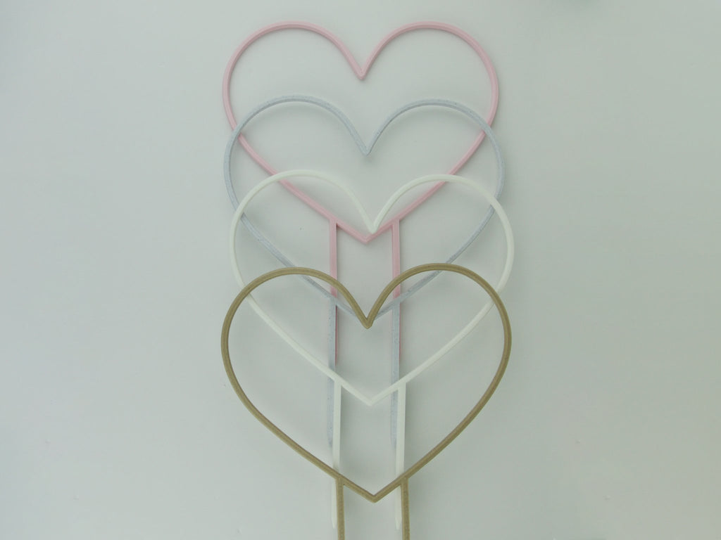 Heart shaped trellises in pastel pink, marble, white and wood