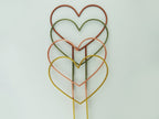 Heart shaped trellises in copper, bronze green, rose gold and gold