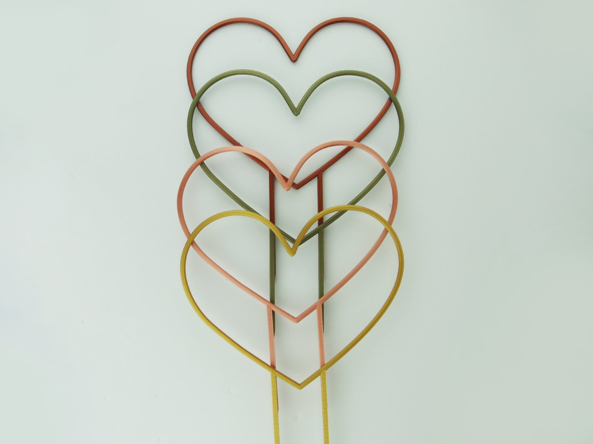 Heart shaped trellises in copper, bronze green, rose gold and gold