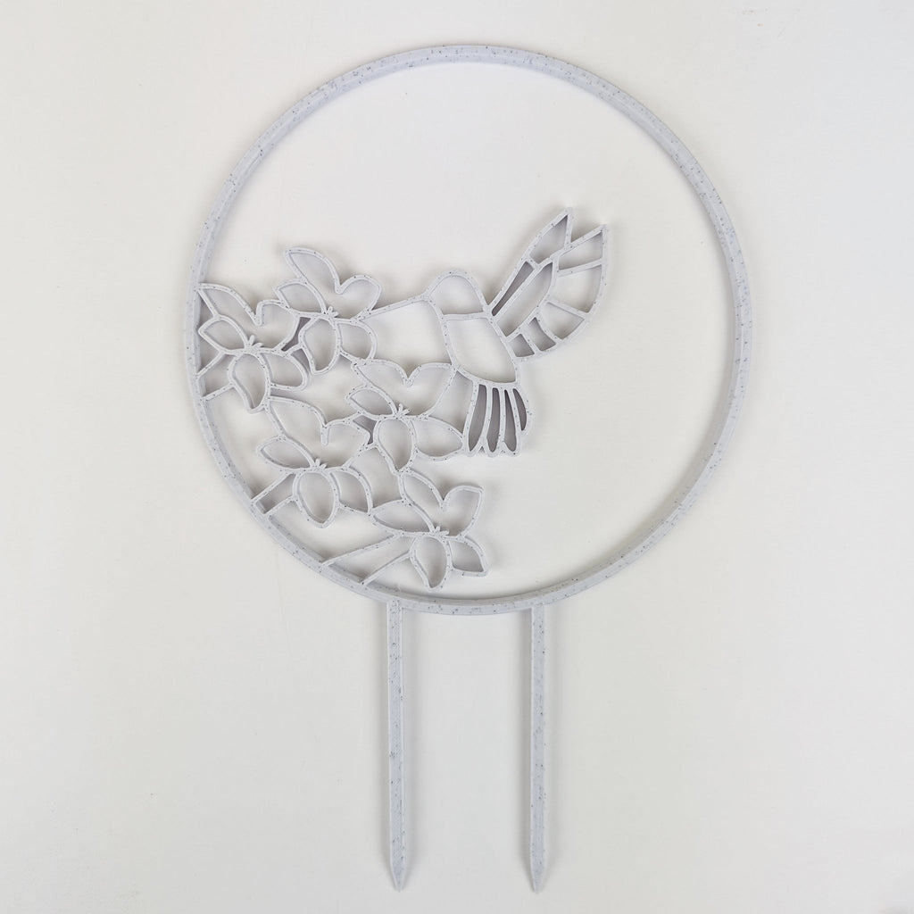 Hummingbird trellis in marble on a white background