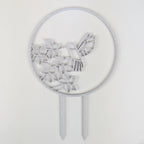 Hummingbird trellis in marble on a white background