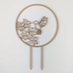 Hummingbird trellis in wood on a white background