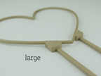Large size heart shaped trellis with a diagonal view to showcase leg connection.