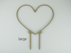 Large heart shaped trellis in wood color