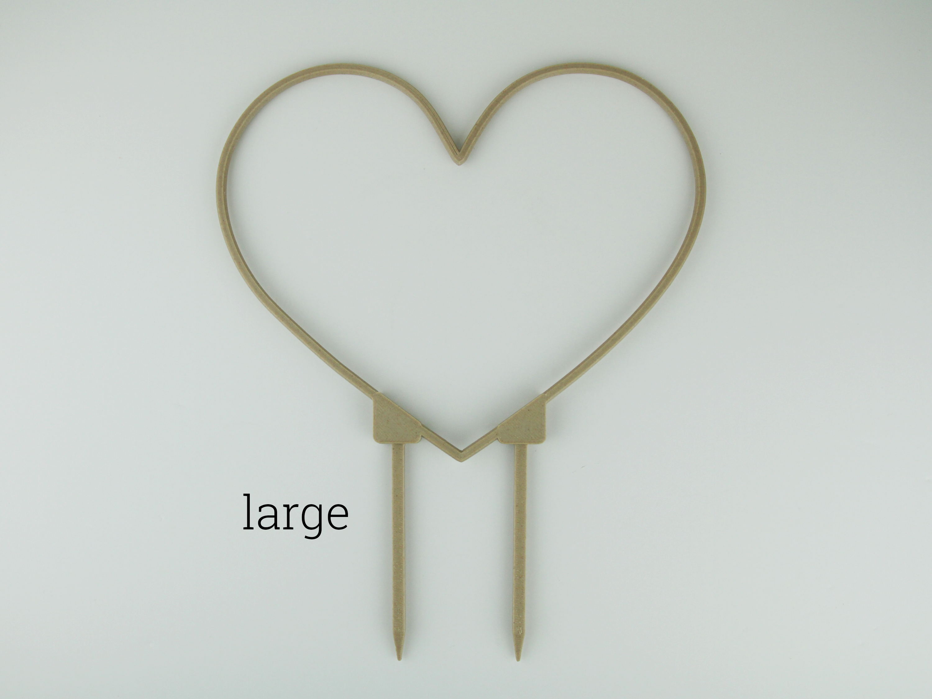 Large heart shaped trellis in wood color