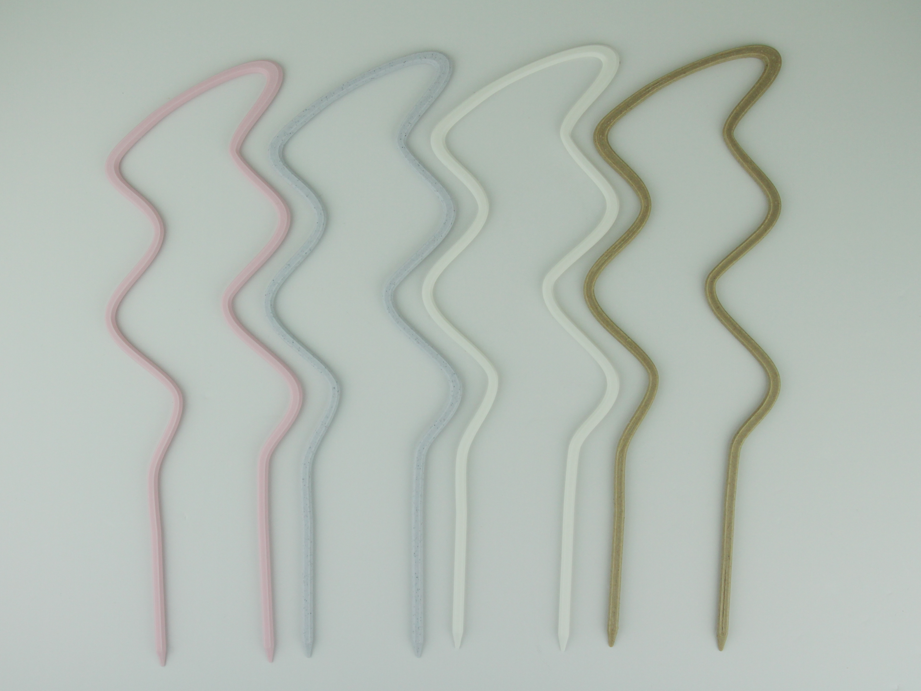 Breezy U trellises in pastel pink, marble, white and wood colors