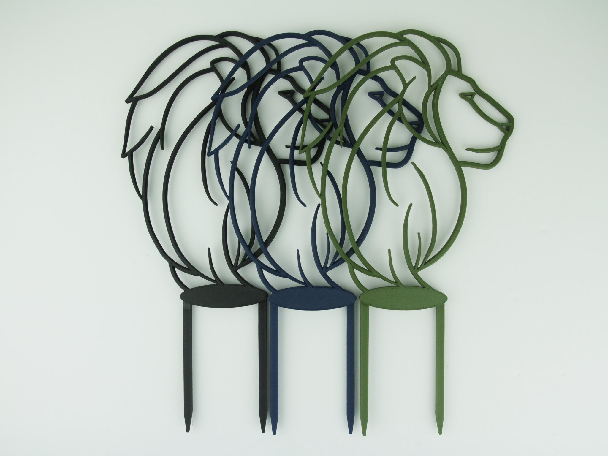 Lion trellises in black, midnight blue and sage green