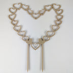Open hearts trellis in wood on a white background