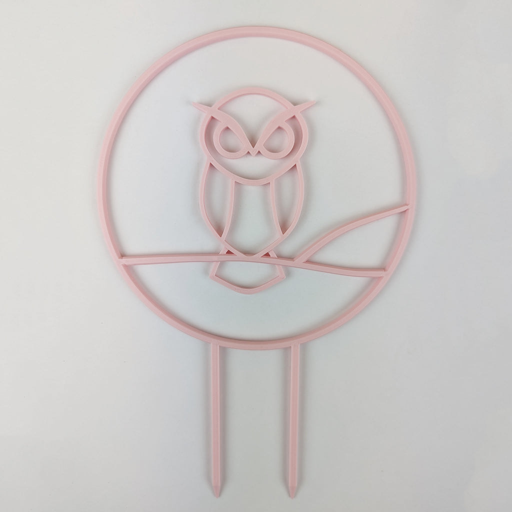 Owl trellis, a circle with an owl silhouette inside, in pastel pink