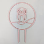 Owl trellis, a circle with an owl silhouette inside, in pastel pink