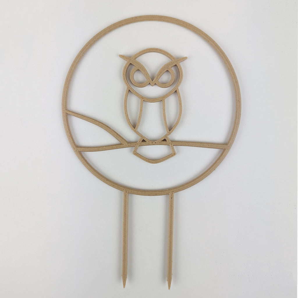 Owl trellis, a circle with an owl silhouette inside, in wood