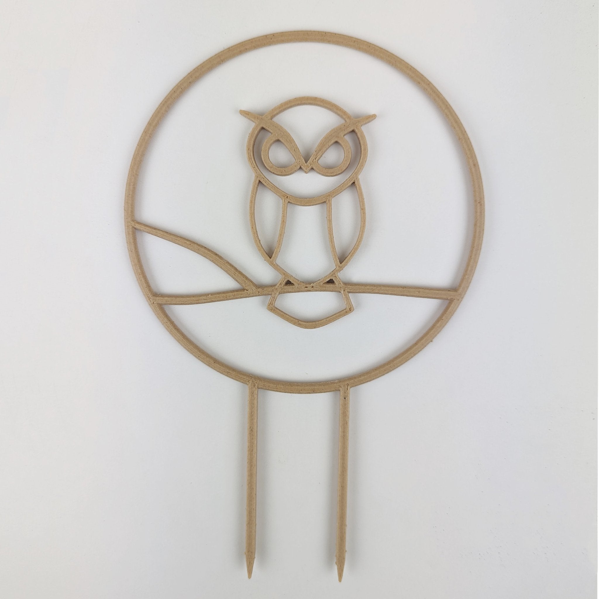 Owl trellis, a circle with an owl silhouette inside, in wood