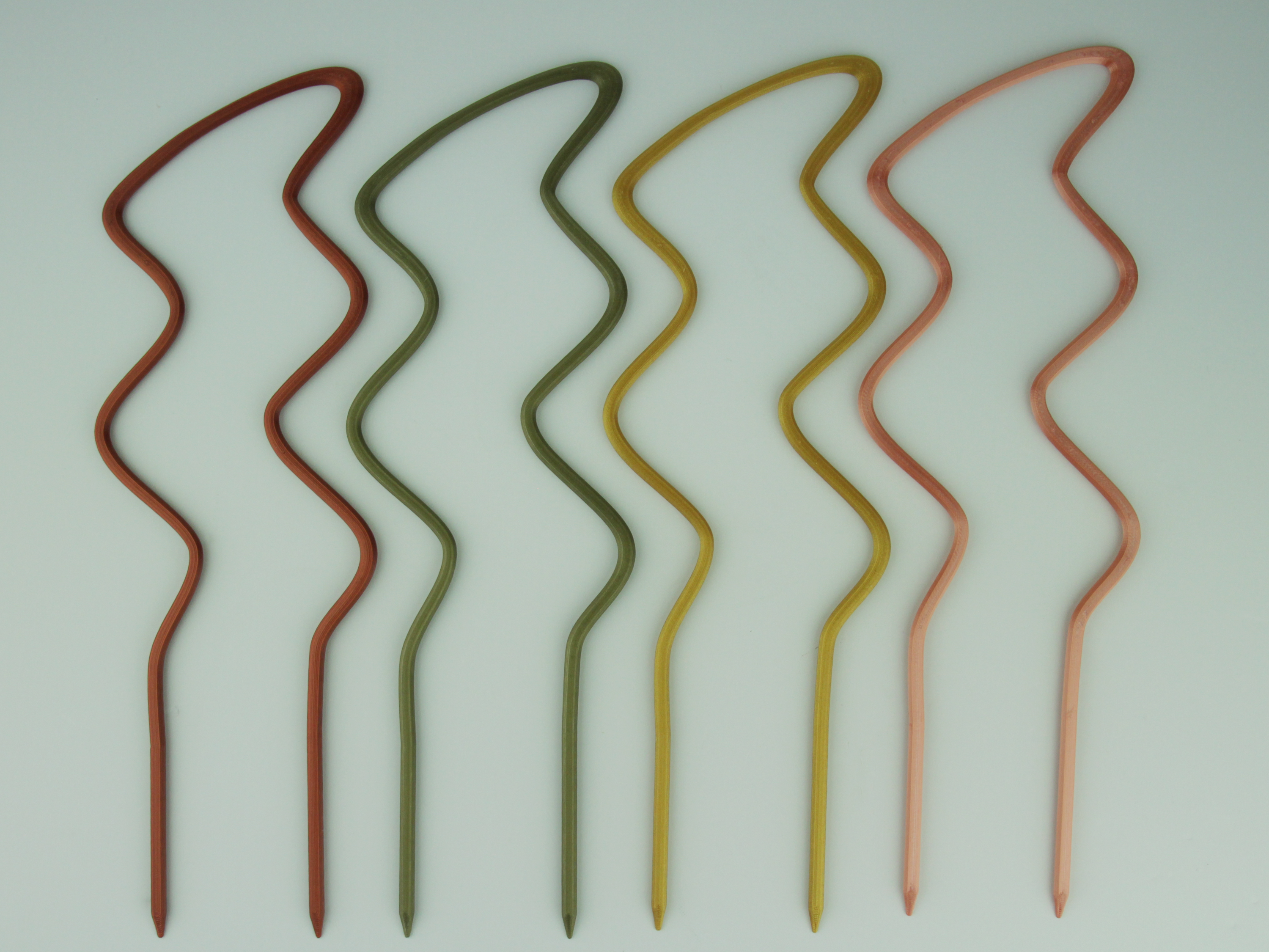 Breezy U trellises in copper, bronze green, gold and rose gold colors