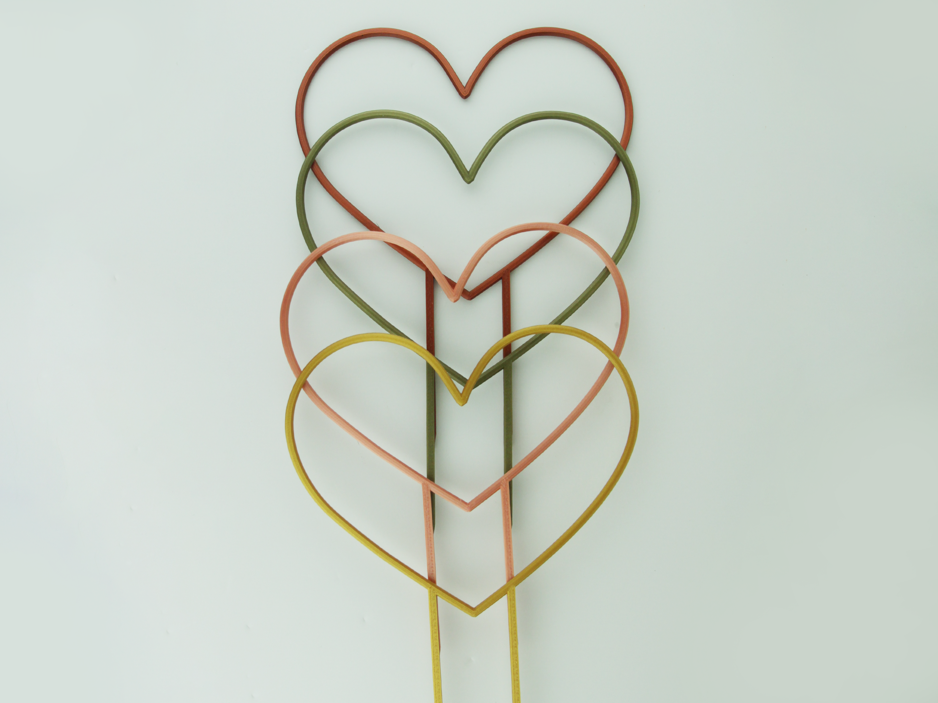 Copper, Bronze Green, Rose Gold and Gold color heart shaped trellises