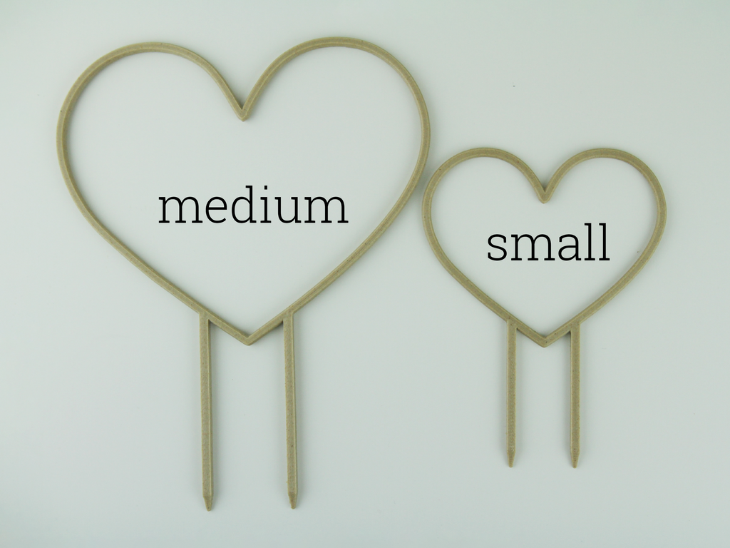 Medium and small size heart shaped trellises side by side
