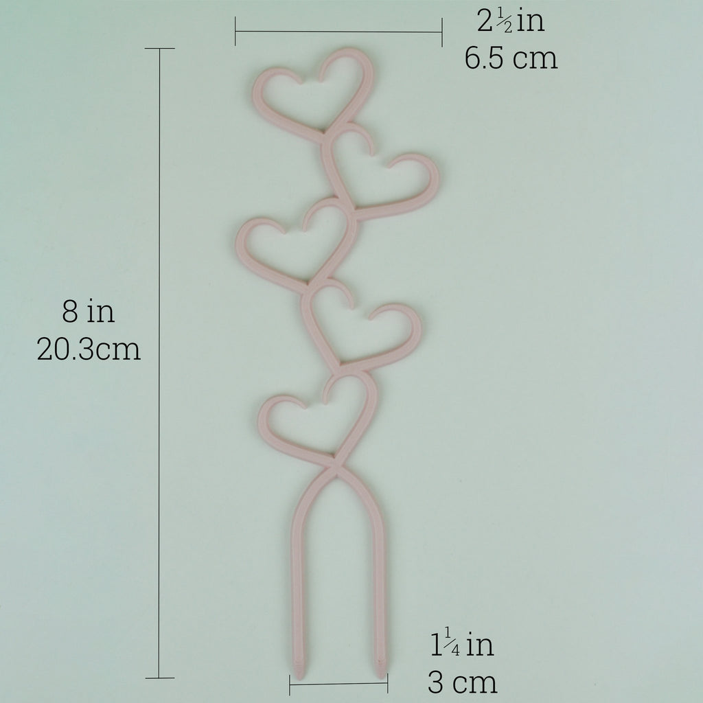 Pastel pink stacked hearts trellis with dimensions, 8 by 2.5 inches