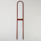 Extra large U trellis in copper on a white background
