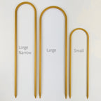 All three sizes of U trellises in gold, side by side