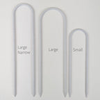 All three sizes of U trellises in marble, side by side