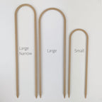All three sizes of U trellises in wood, side by side