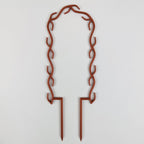 U wreath trellis in copper on a white background