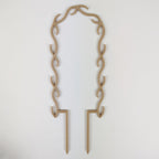 U wreath trellis in wood on a white background