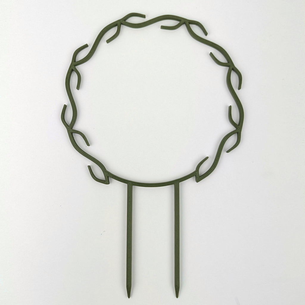 Wreath trellis in dark army green, built-in hooks circling like a wreath