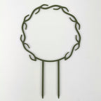 Wreath trellis in dark army green, built-in hooks circling like a wreath