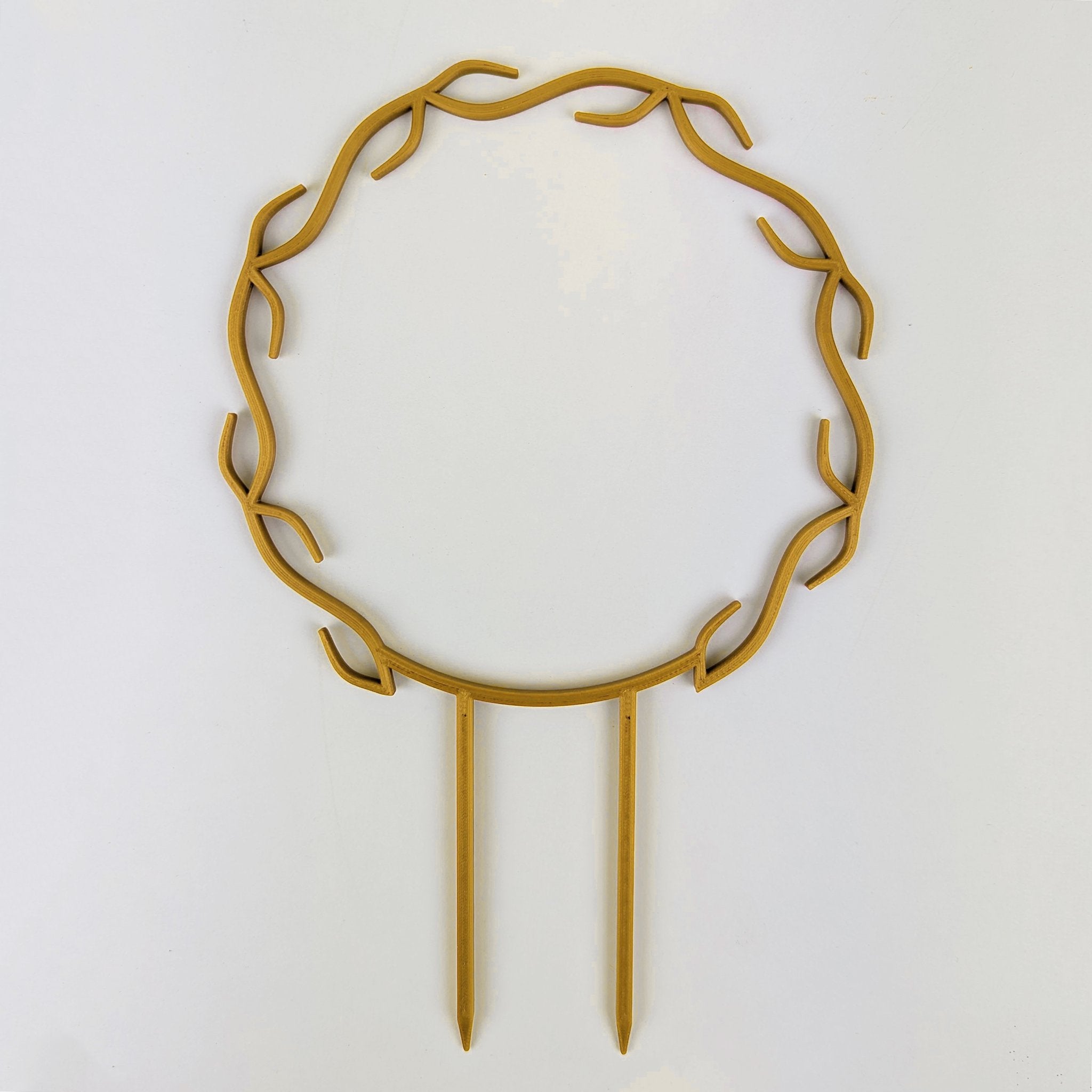 Wreath trellis in gold, built-in hooks circling like a wreath