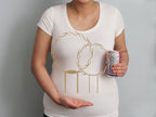 Wreath trellis shown against a torso for size reference