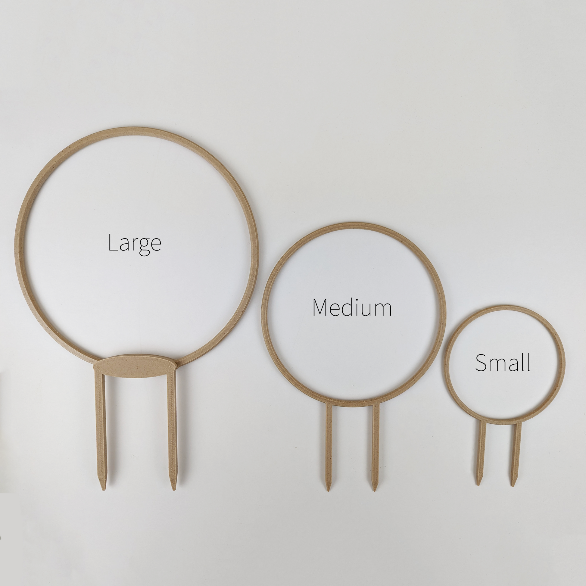 Large, medium and small circle trellises side by side for size comparison