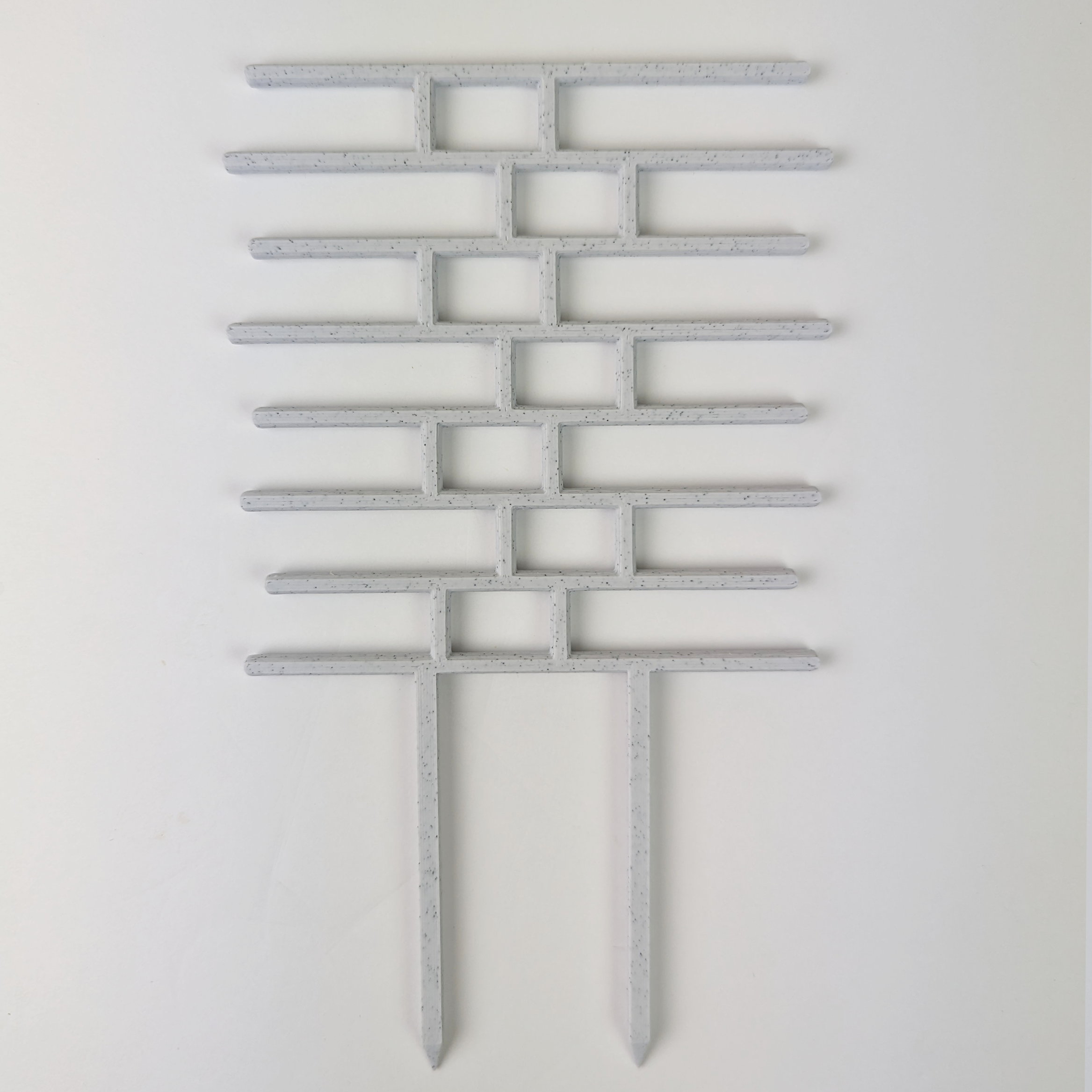 Brick pattern inspired trellis in marble