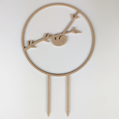 Sloth circle trellis in a wood finish, a sloth hanging from a branch inside the circle