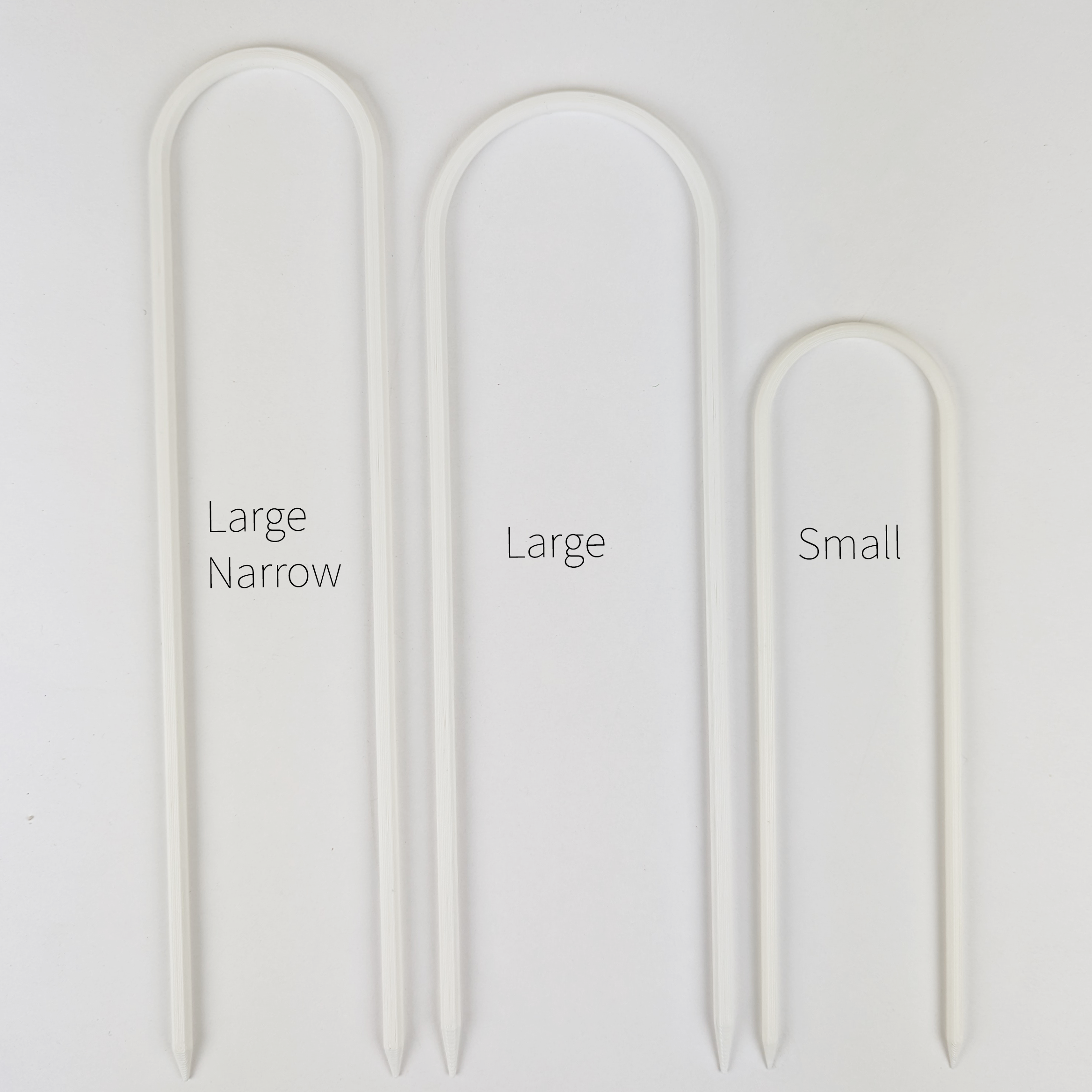 All three sizes of U trellises in white color, side by side