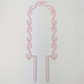 U Wreath Trellis in pastel pink colour against a plain white background
