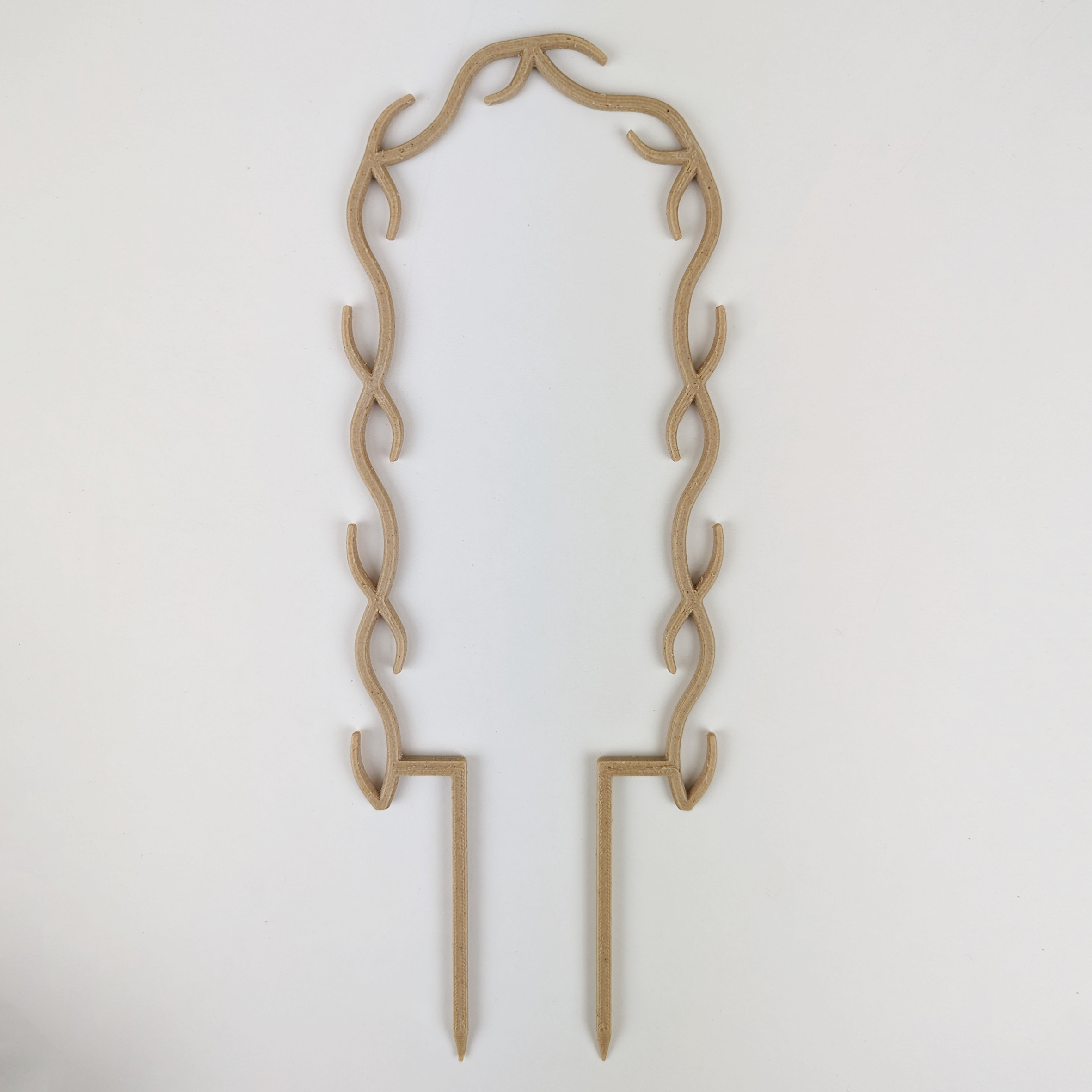 U Wreath Trellis in wood colour against a plain white background