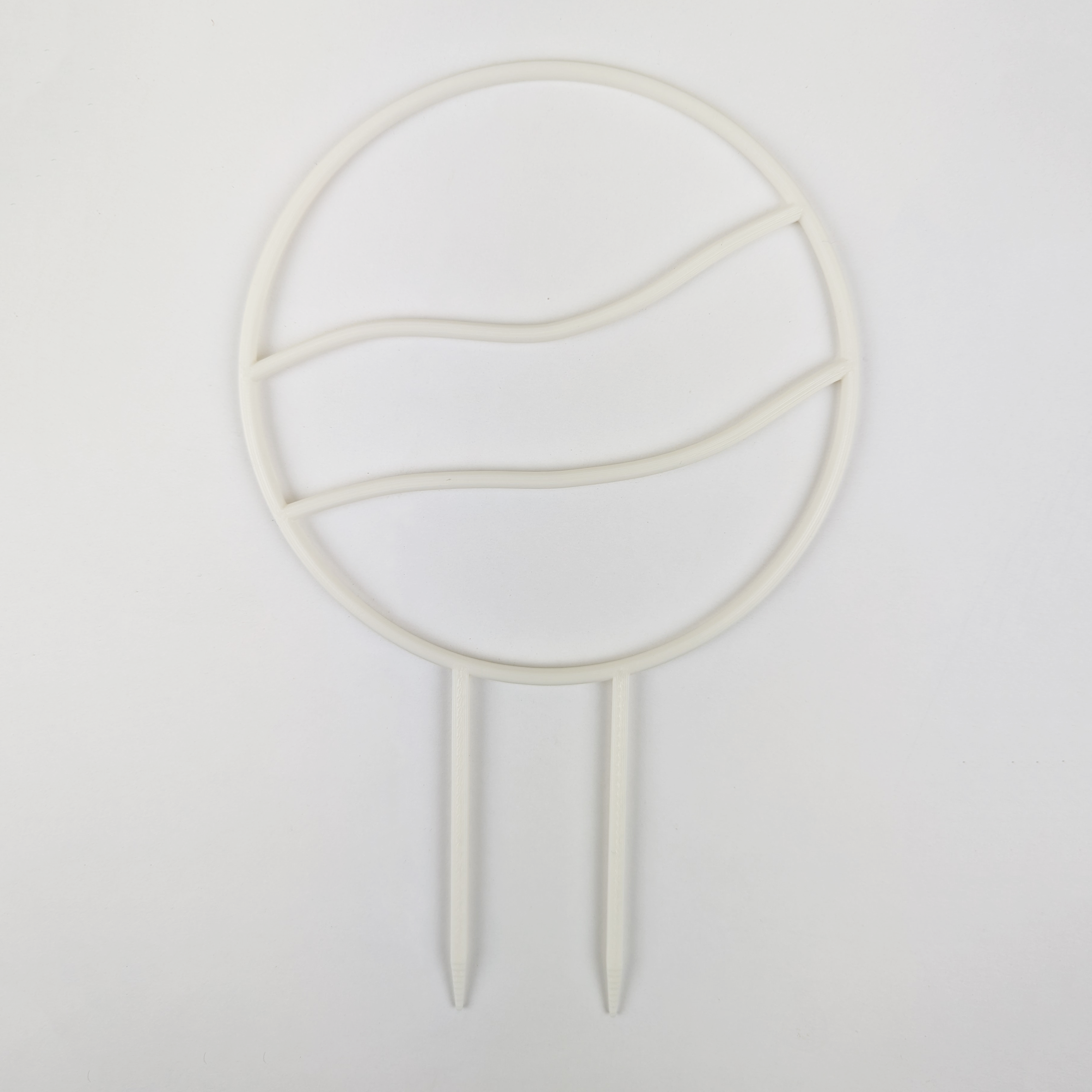 A circle trellis with two horizontal wavy lines running across the middle. It is against a white background. The colour of the trellis is white..