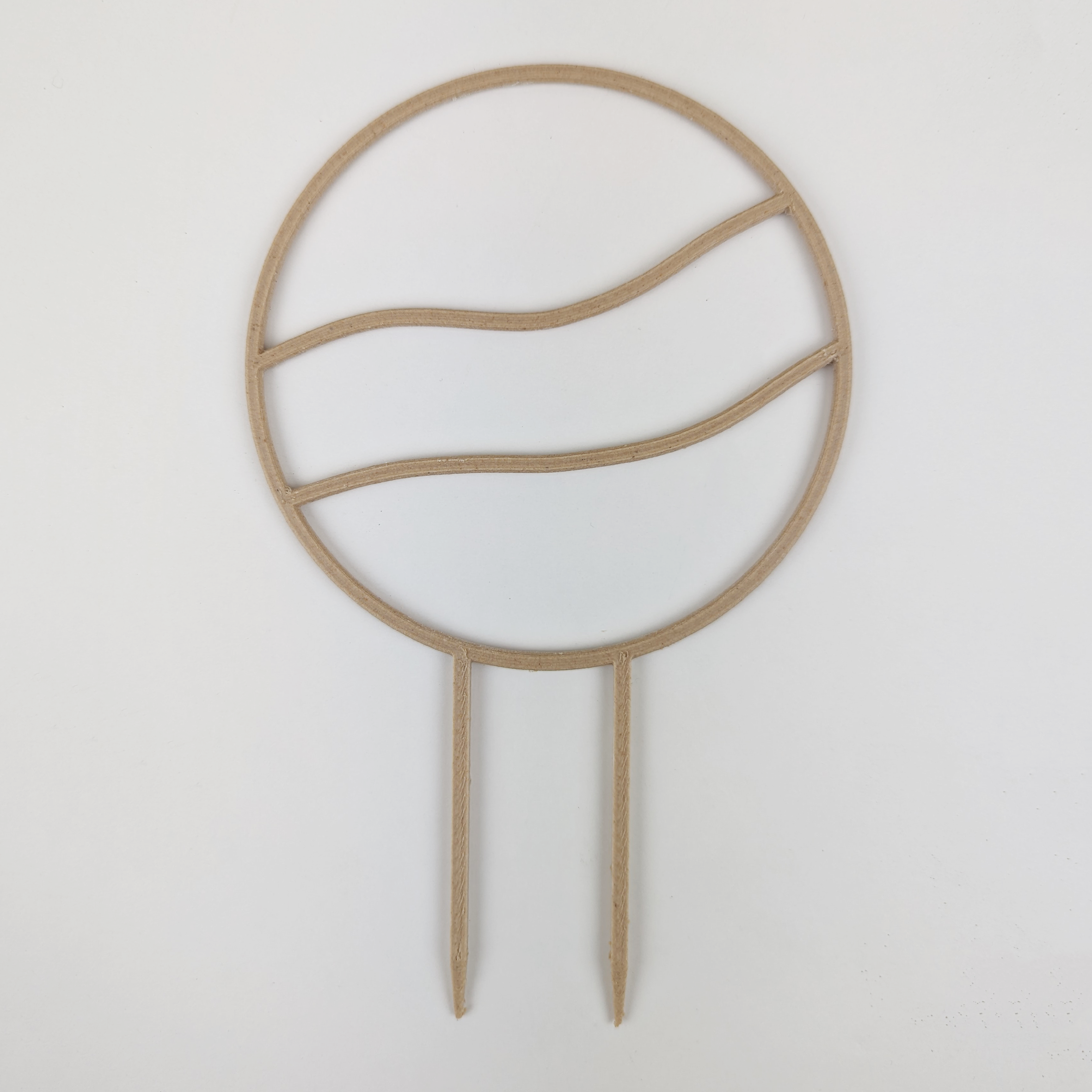 A circle trellis with two horizontal wavy lines running across the middle. It is against a white background. The colour of the trellis is wood.