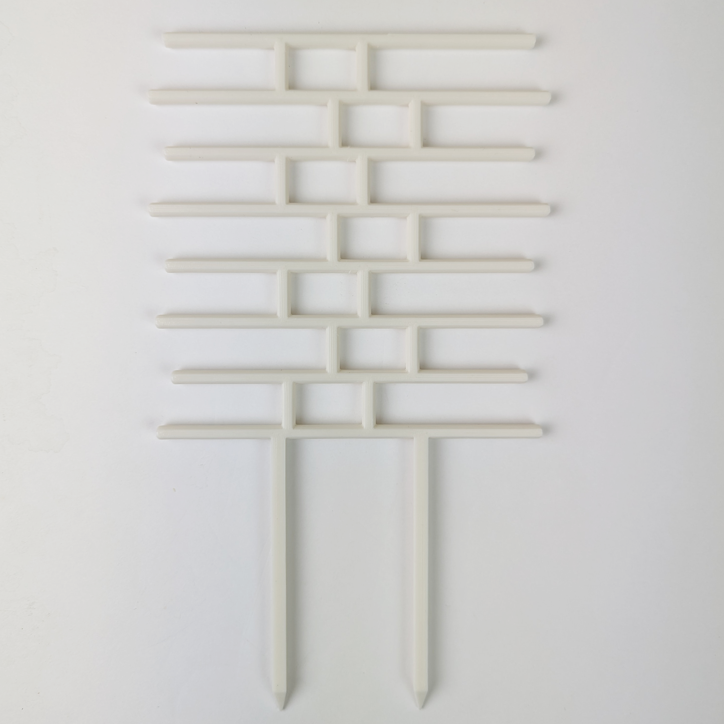 Brick pattern inspired trellis in white