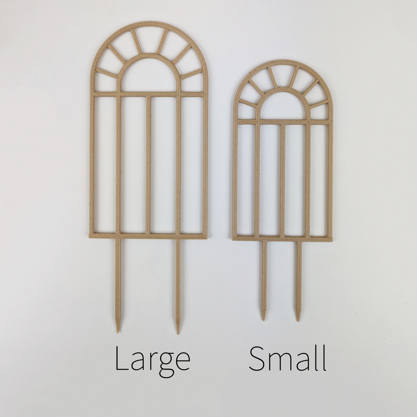 Two arch window trellises, one large and small side by side to show size difference.