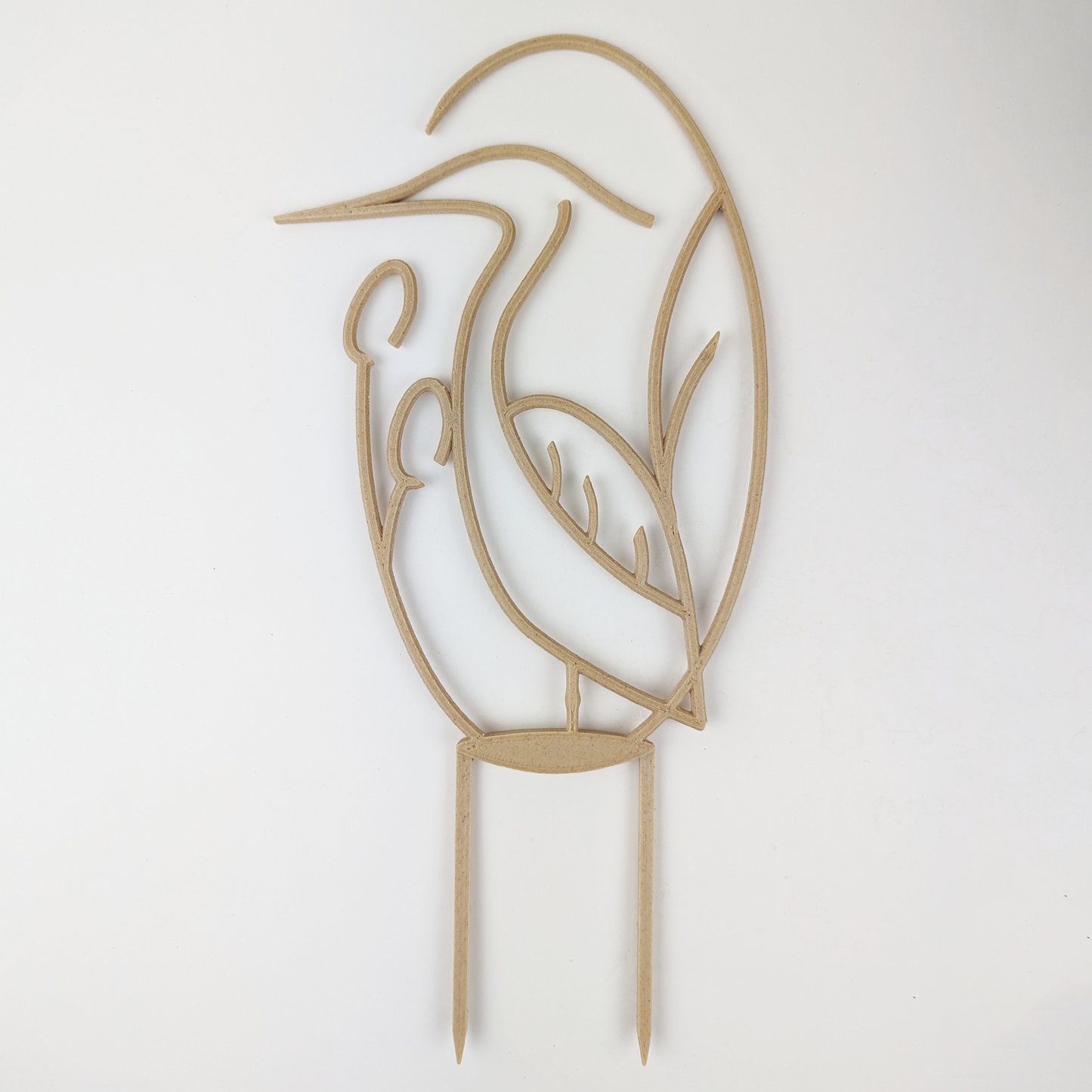 Houseplant trellis in the shape of a heron, in wood color against a plain white background.